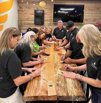 Volunteers make gift bags